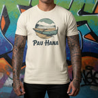 Beige t-shirt with a graphic design and 'Pau Hana' text on a white background