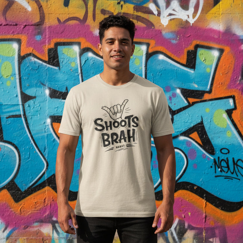 Beige t-shirt with 'Shoots Brah' text and hand gesture design on a white background