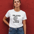 Person wearing a white t-shirt with 'Island Love' design against a red wall